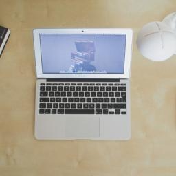 A computer on a desk.